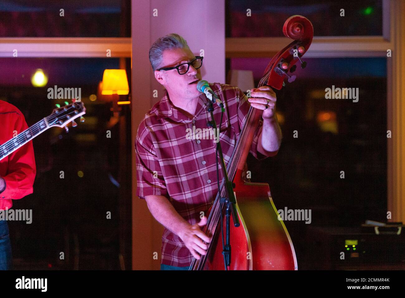 Television presenter and film critic Mark Kermode playing with his band The Dodge Brothers playing at Key West on Bournemouth Pier. The band are: Aly Stock Photo