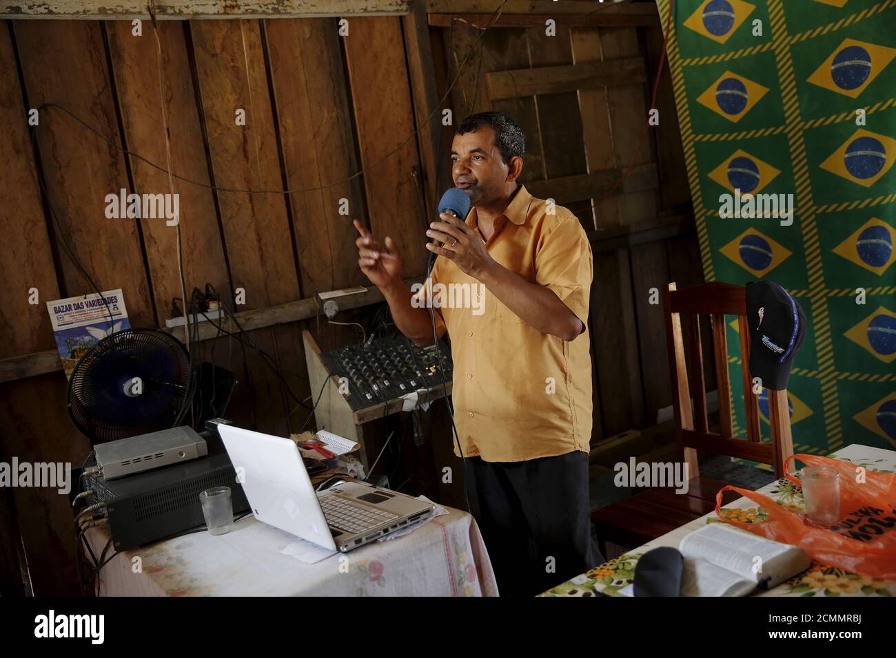 Isolino, 58, speaks on an evangelical radio station in Rio Pardo next to Bom  Futuro National Forest, in the district of Porto Velho, Rondonia State,  Brazil, August 31, 2015. The town of