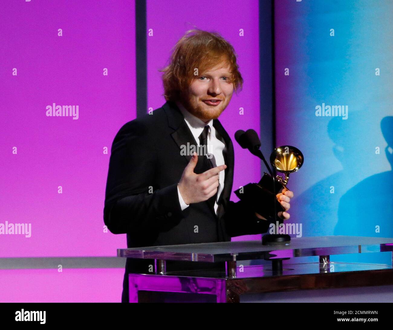 Ed Sheeran accepts the award for Best Pop Solo Performance for "Thinking  Out Loud" at the