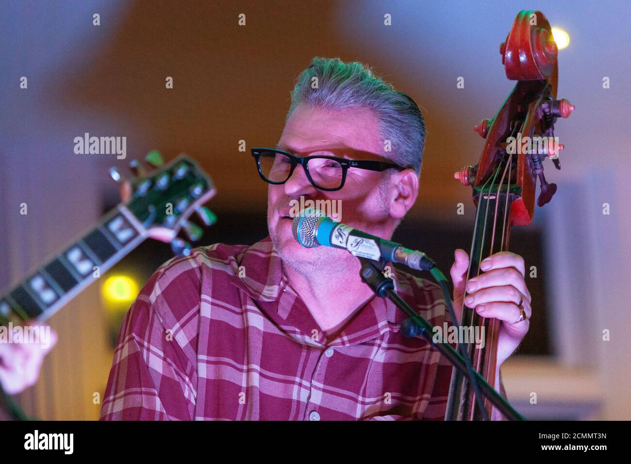 Television presenter and film critic Mark Kermode playing with his band The Dodge Brothers playing at Key West on Bournemouth Pier. The band are: Aly Stock Photo