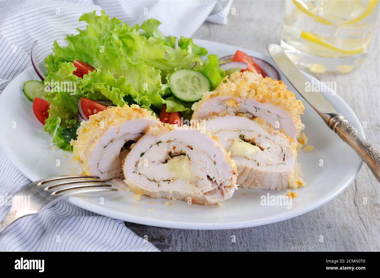 Sliced baked until golden, crispy crust chicken roll in breadcrumbs with Parmesan cheese Stock