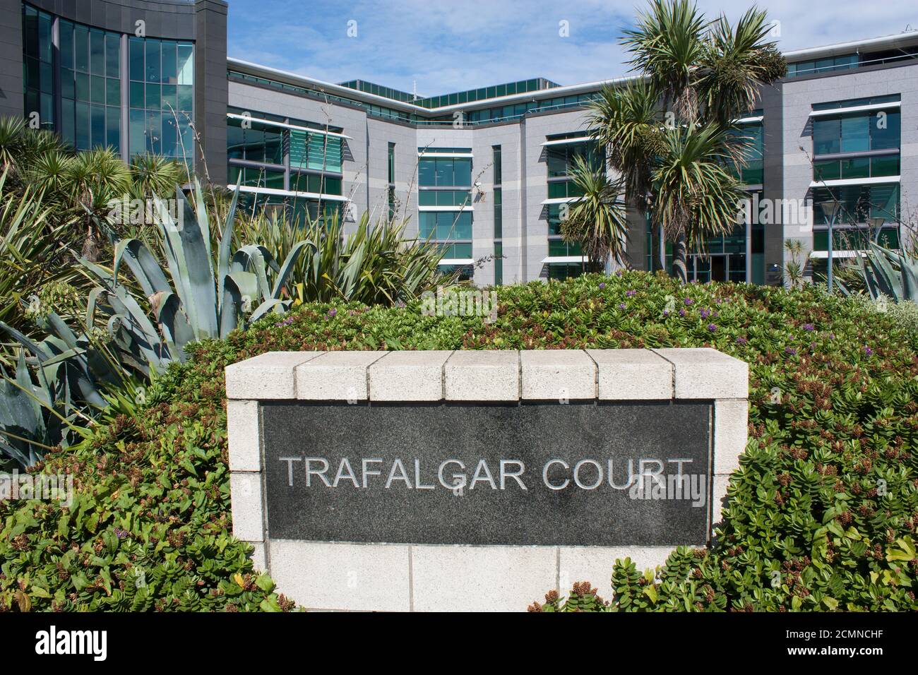 Channel Islands. Guernsey. St Peter Port. St George's Esplanade. Admiral Park. Trafalgar Court. Sign at front of building. Stock Photo