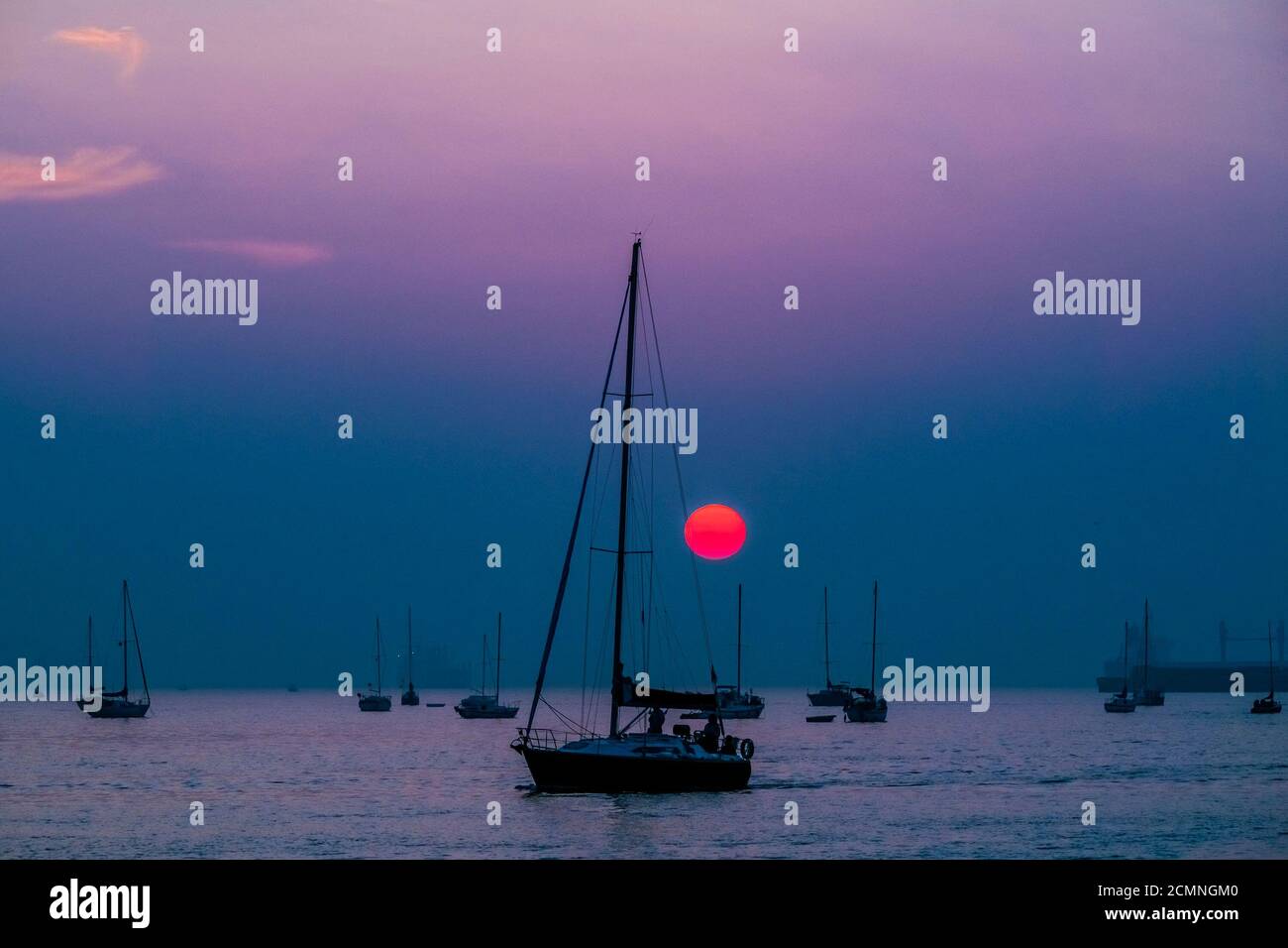 Boats at sunset, English Bay, Vancouver, British Columbia, Canada Stock Photo