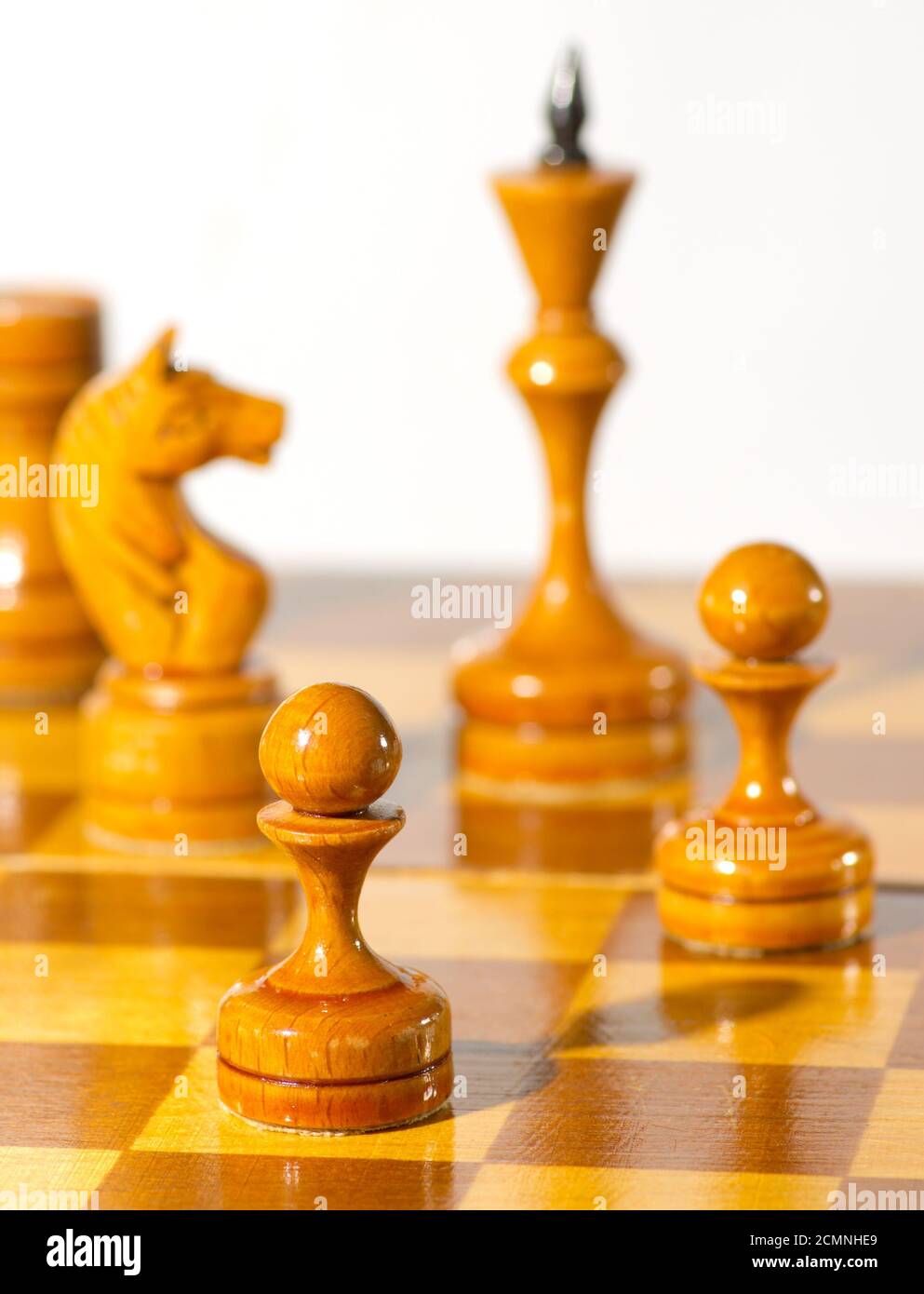 Chess pieces on white background Stock Photo