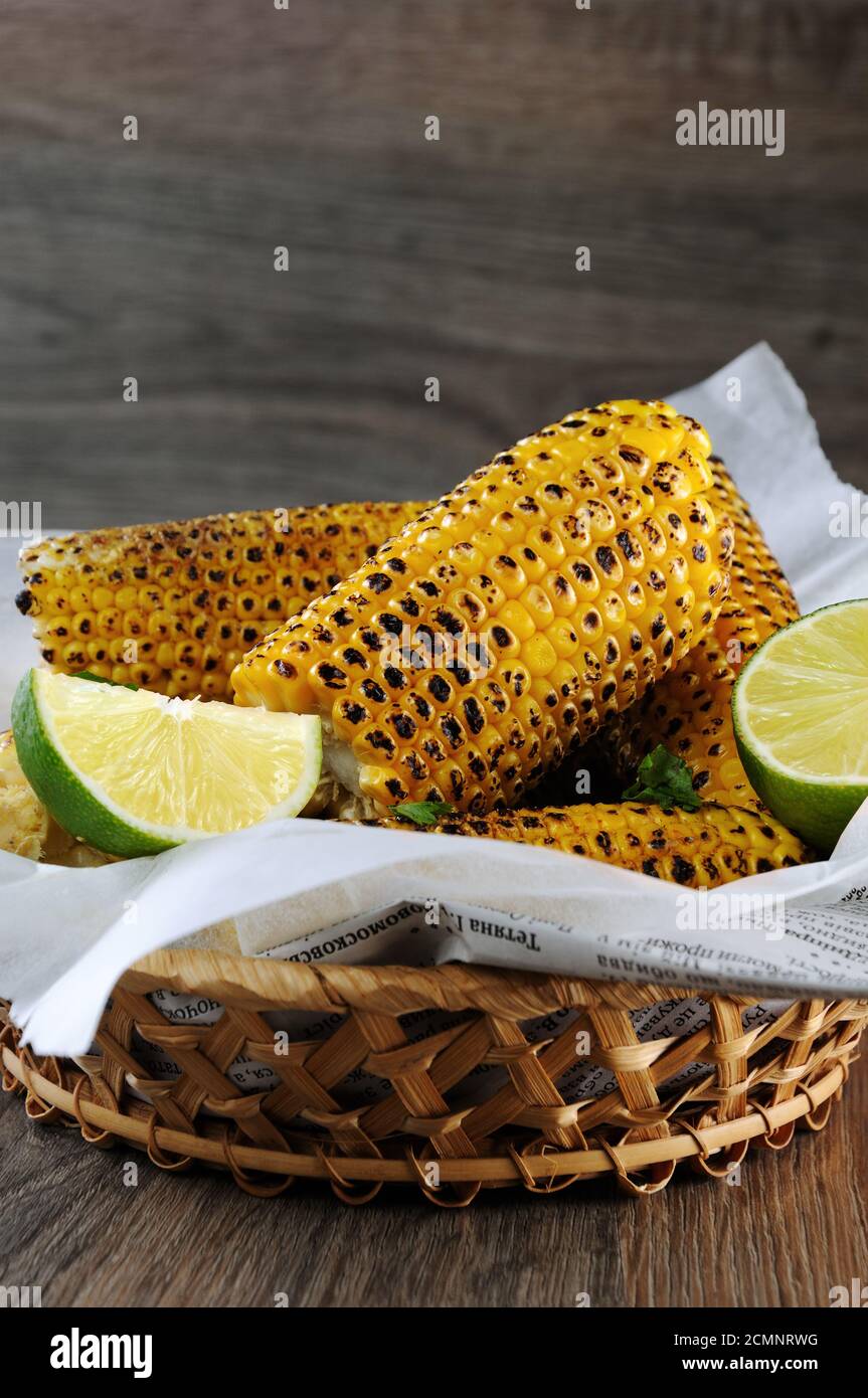 Delicious fried corn, grated with lime and seasoned with spicy spices