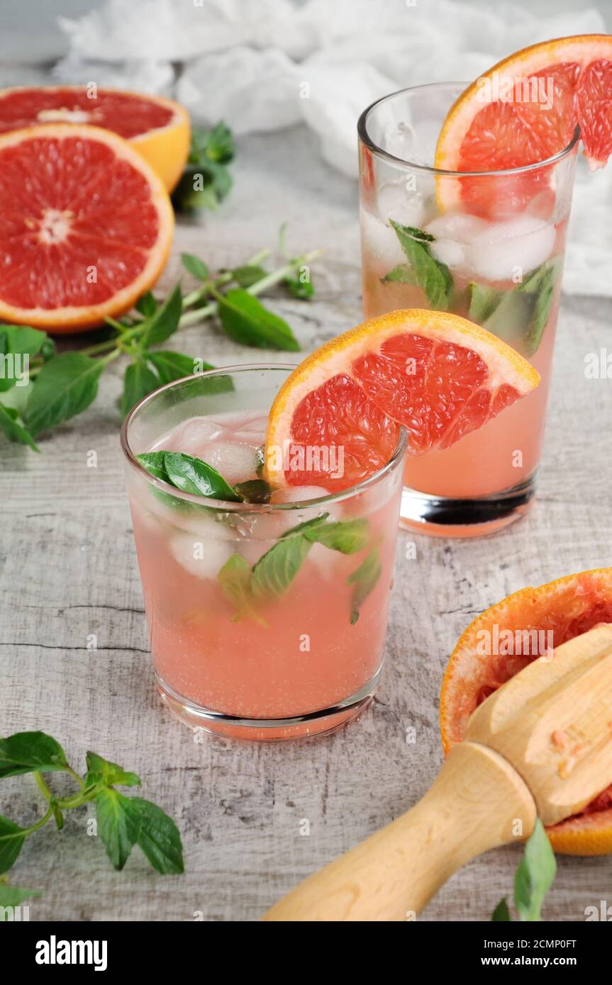 Cocktail of juice, squeezed red grapefruit and leaves of the delicate