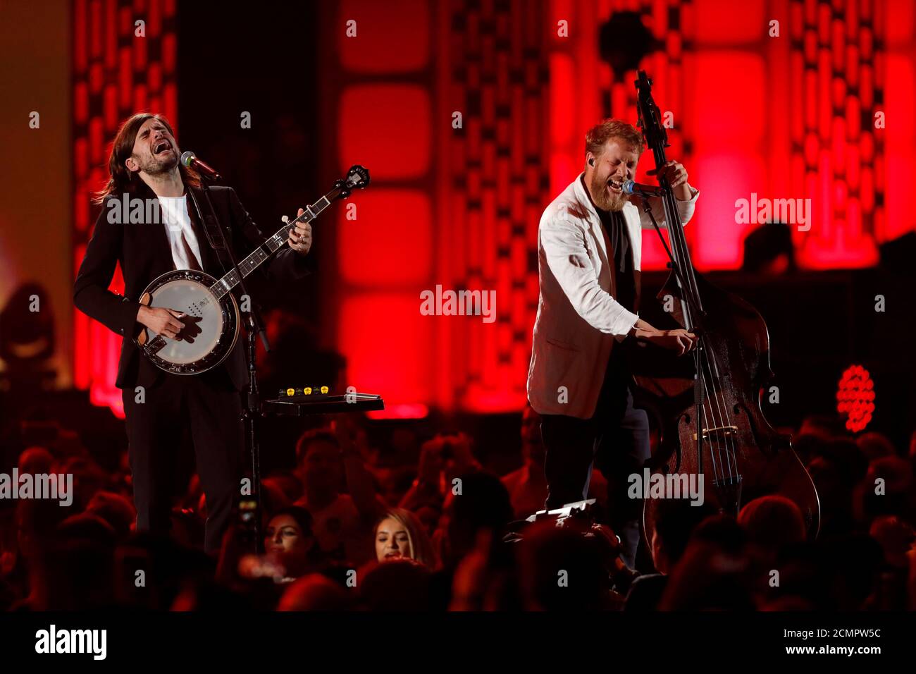 Mumford & Sons banjoist Winston Marshall (L) and bassist Ted Dwane perform during the iHeartRadio Music Festival at T-Mobile Arena in Las Vegas, Nevada, U.S. September 21, 2019. REUTERS/Steve Marcus Stock Photo