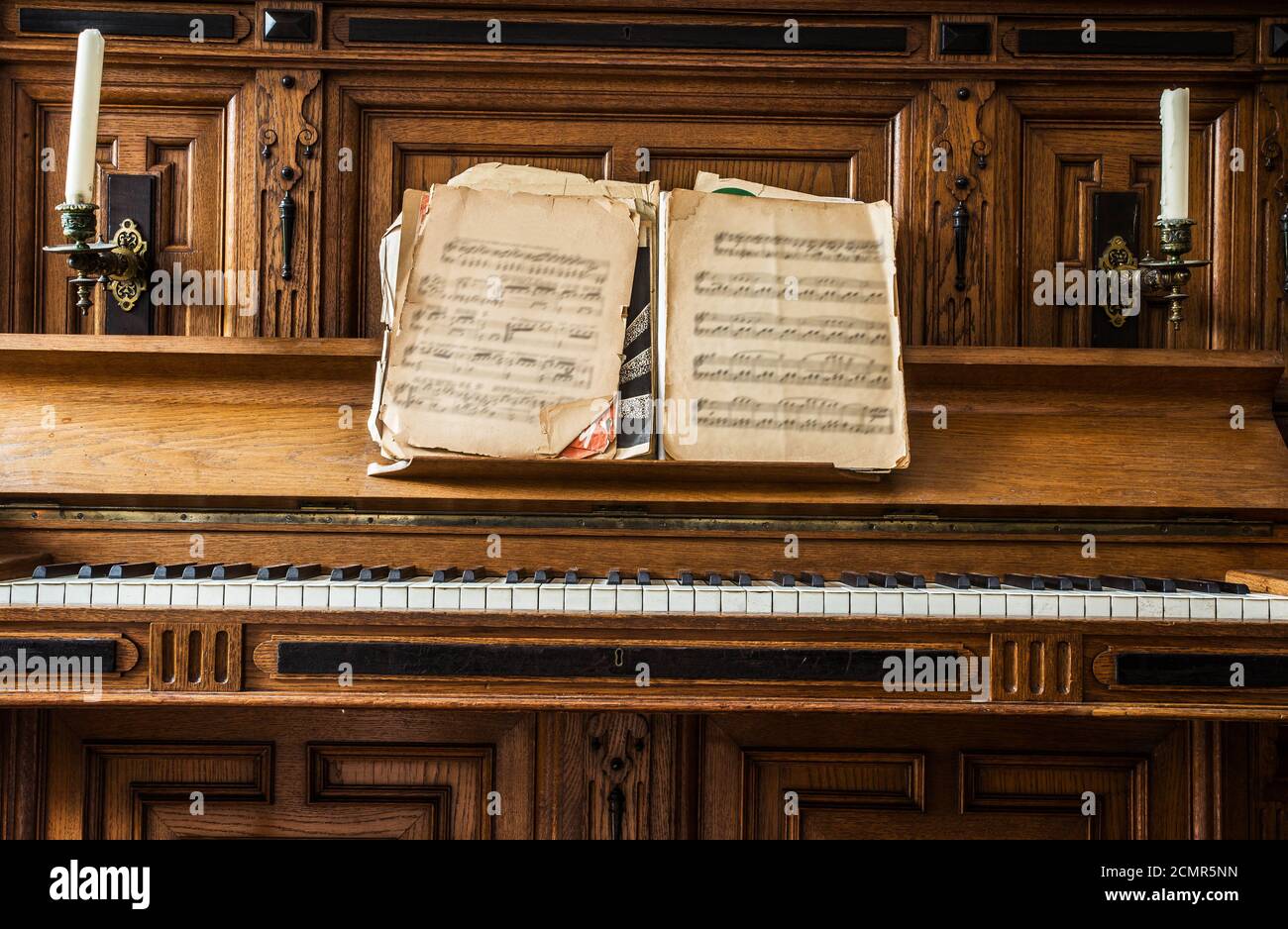 Old Key String Instrument Old wooden piano keys on wooden musical instrument in front view ...