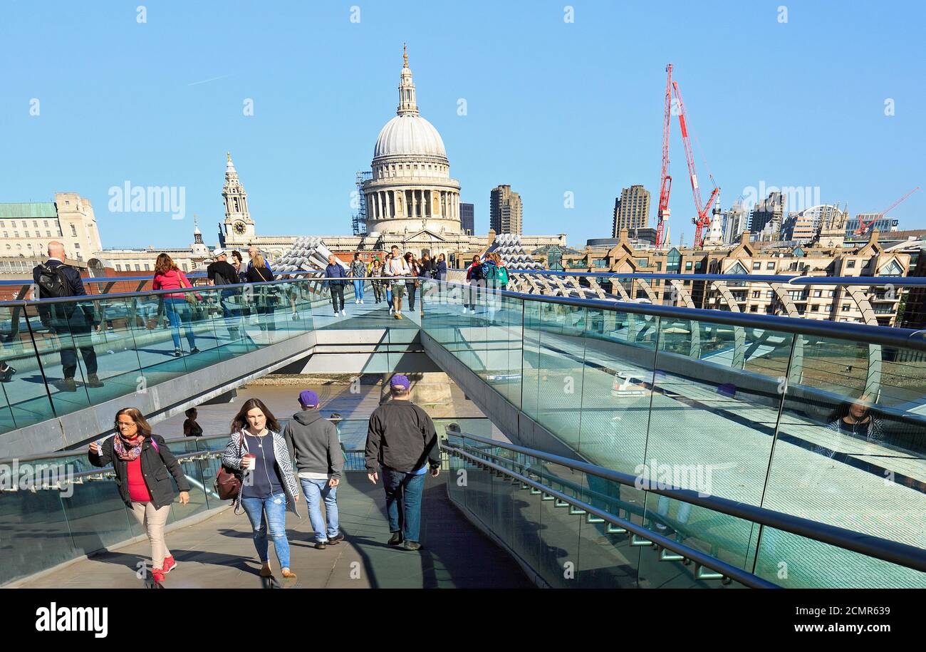 View of The Millennium Bridge entrance, it is a popular bridge with many tourists using it to view the iconic St Pauls Cathedral in London.  It is a p Stock Photo