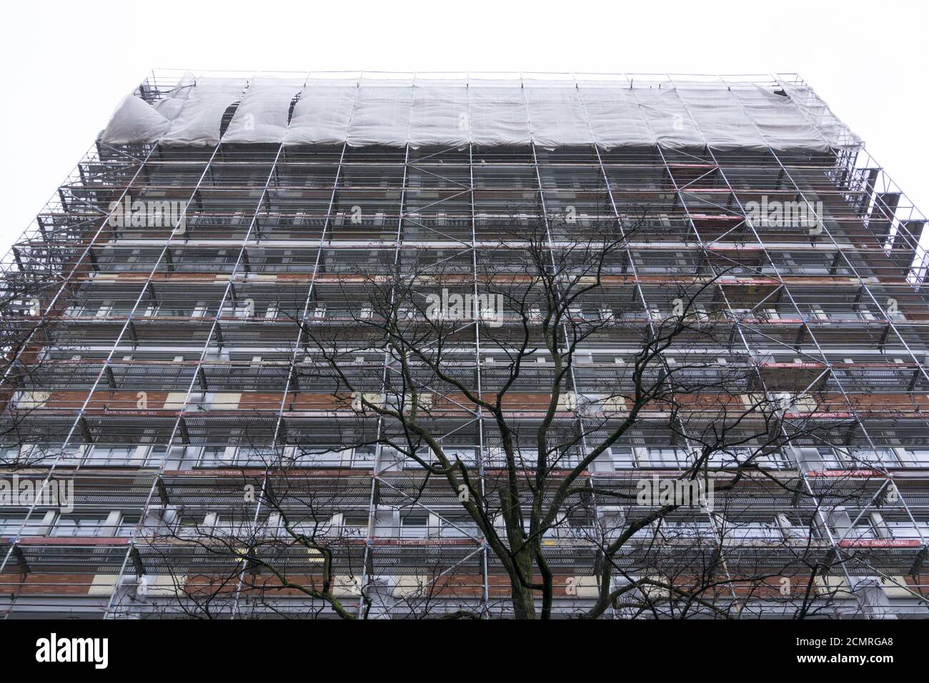 Building with a scaffold Stock Photo - Alamy