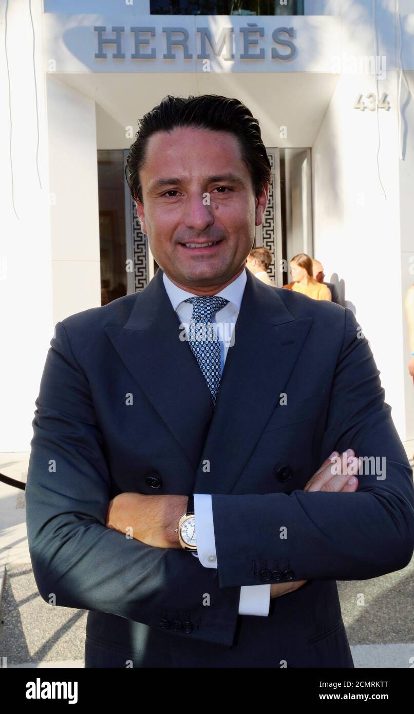 Hermes International's CEO Axel Dumas poses before the unveiling of the new  Hermes boutique on Rodeo Drive in Beverly Hills, California September 3,  2013. REUTERS/Fred Prouser (UNITED STATES - Tags: BUSINESS FASHION