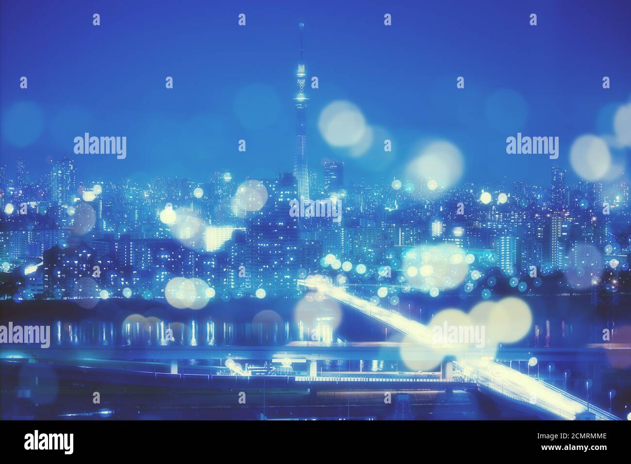 Nightlife Background in Tokyo. Tokyo Skyline with Blur Bokeh Lights Decoration in Colorful Filter. Tokyo Sky Tree Cityscape Background. Night sky and Stock Photo