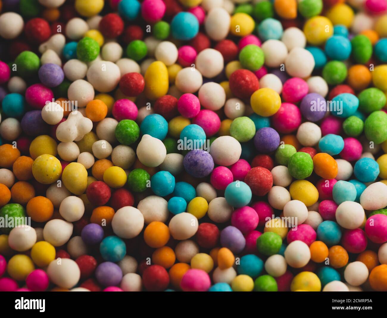 Macro close up portrait of colorful candy sprinkles , studio lighting ...