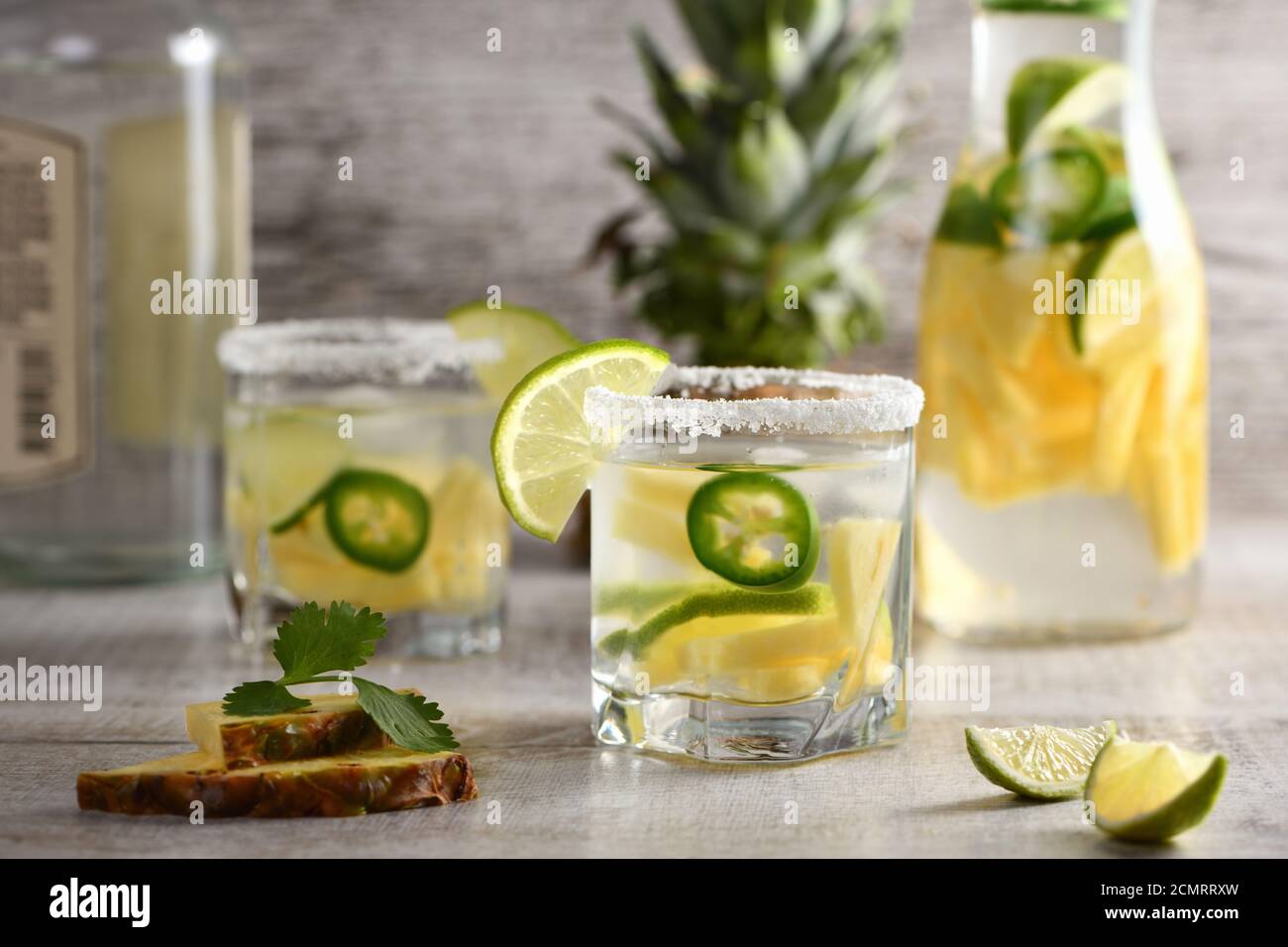 Spicy Margarita. Tequila Infused on Slices of Fresh Pineapple, Lime