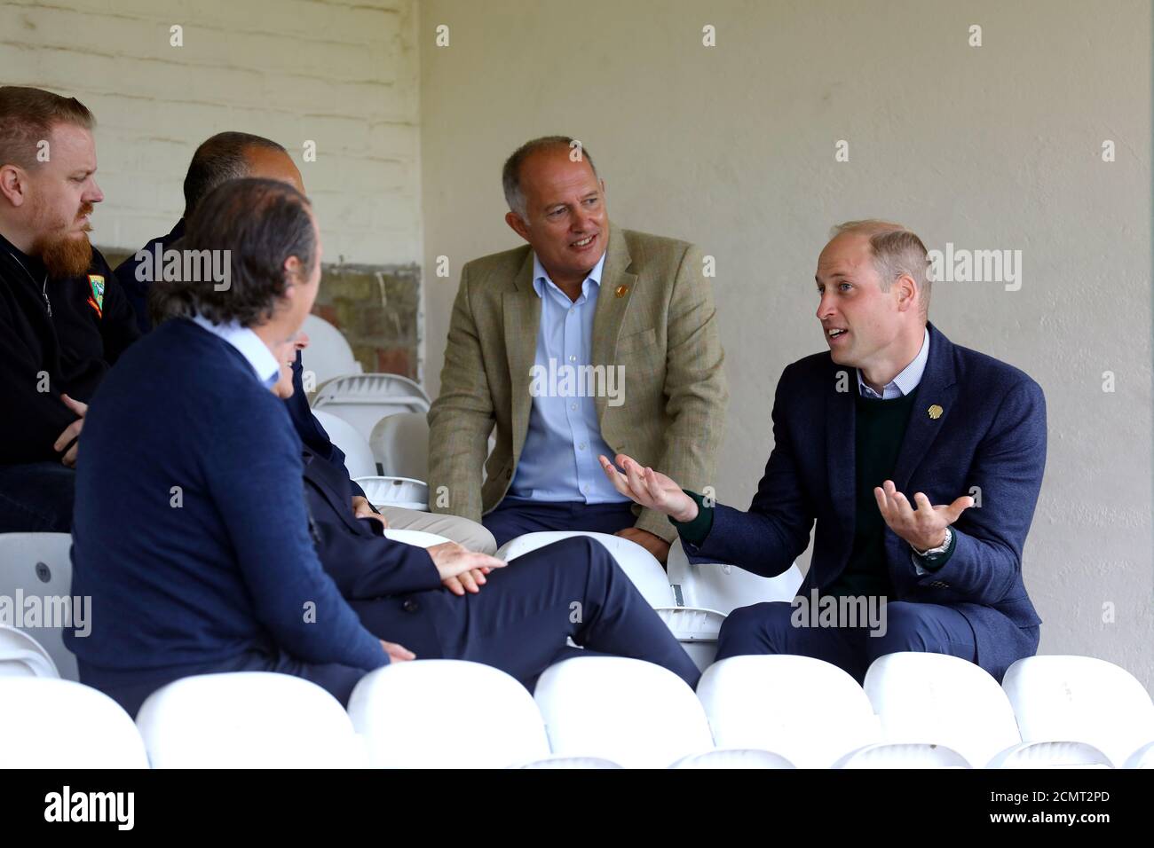 Britain's Prince William, Duke of Cambridge gestures as he speaks to Rob Morris, Co-Owner of Silver Jubilee Park and Vice President of Hendon F.C. and Edgware Town F.C., and club officials during his visit to Hendon FC, as part of the Heads Up mental health campaign at Hendon F.C., in London, Britain September 6, 2019. Tim P. Whitby/Pool via REUTERS Stock Photo