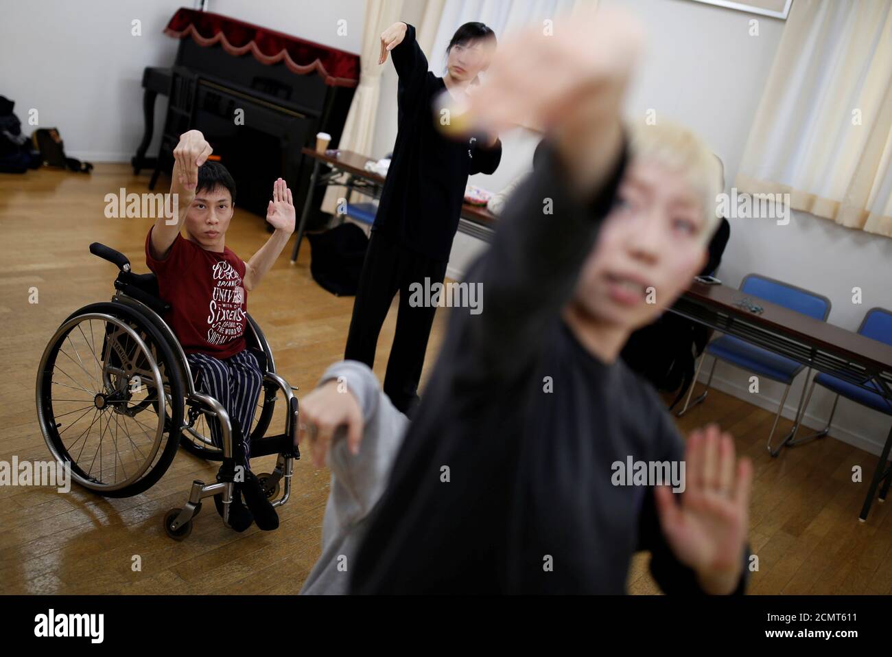 Kenta Kambara, 34, rehearses for an upcoming performance at a studio in Tokyo, Japan, February 1, 2020. Kambara who was born with spina bifida, a disorder that paralysed his lower body, aims to perform at the Tokyo 2020 Paralympics opening or closing ceremonies. 'If you can't walk with your legs, it's okay to walk with your hands. If there is something you want to do but cannot, it's okay to find another way,' he said. REUTERS/Kim Kyung-Hoon TPX IMAGES OF THE DAY.     SEARCH 'WHEELCHAIR DANCER' FOR THIS STORY. SEARCH 'WIDER IMAGE' FOR ALL STORIES. Stock Photo