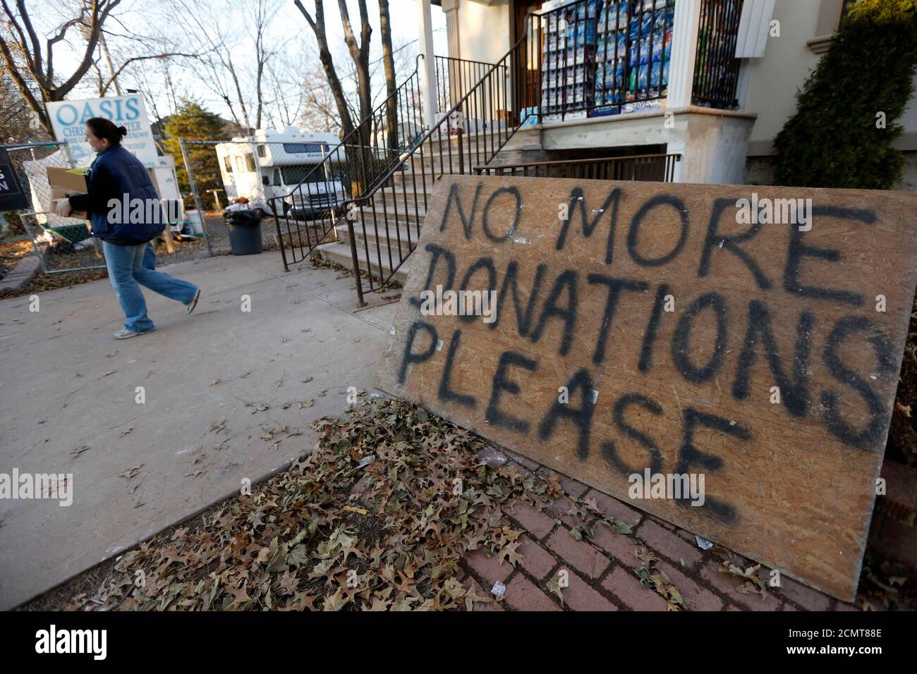 A sign reads 'No More Donations Please' is placed outside the Oasis Christian Center in the Midland Beach area of Staten Island, New York, November 14, 2012. The Oasis Christian Center despite having been flooded and damaged in the superstorm has become a center of donations and aid for the surrounding neighborhood. The federal government's flood insurance program may not have access to enough funds to cover anticipated claims from Hurricane Sandy victims, a top official at the Federal Emergency Management Agency said on Thursday.   REUTERS/Brendan McDermid (UNITED STATES  - Tags: DISASTER ENV Stock Photo