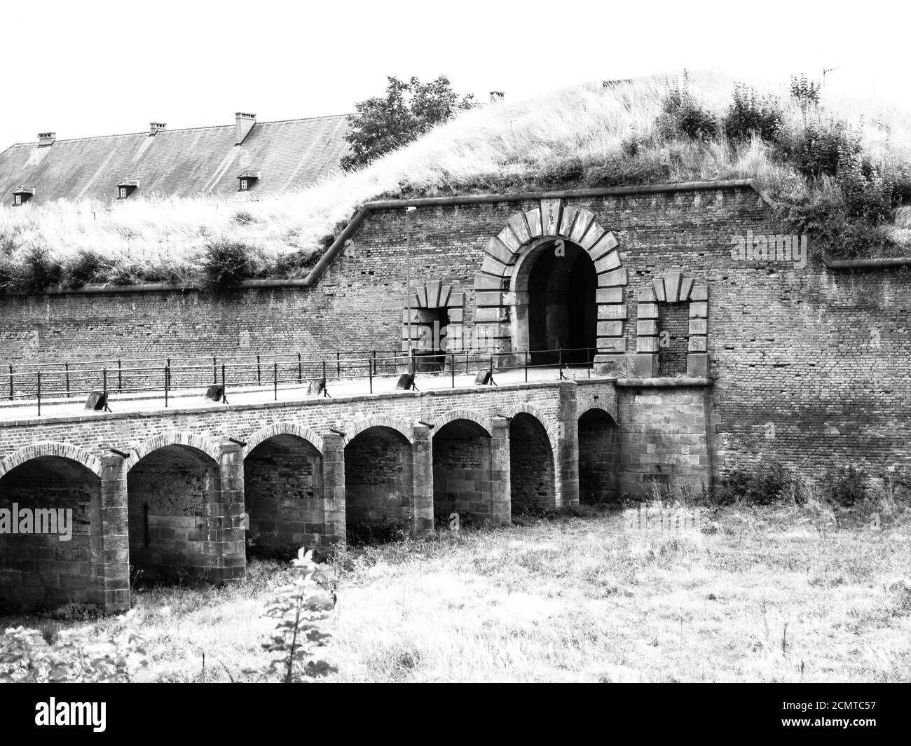 Entrance gate and bridge to the fortificated town Terezin, Czech Republic. Black and white image. Stock Photo