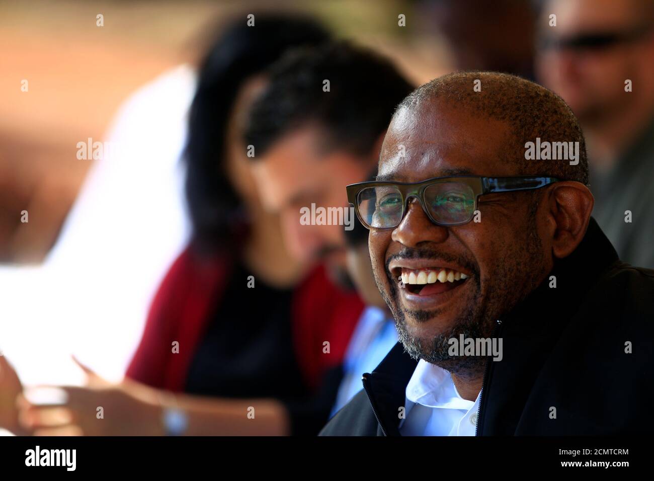U.S. actor Forest Whitaker smiles during his visit to expand the Youth Peacemaker Network in Acholi sub region, in Gulu town, northern Uganda May 2, 2017. REUTERS/James Akena Stock Photo