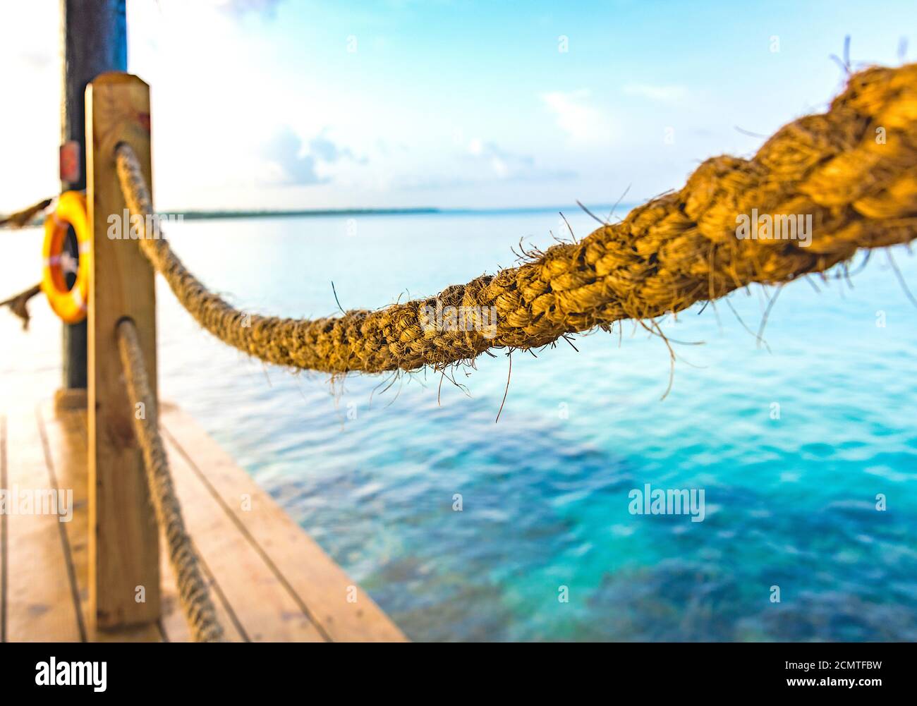 hot tropical day the Caribbean sea pier with pergola Stock Photo
