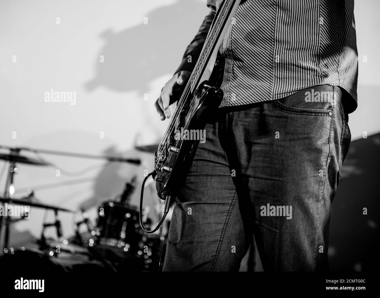 musician playing electric guitar on a stage Stock Photo Alamy