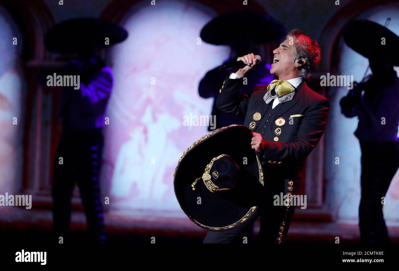 The 20th Annual Latin Grammy Awards - Show - Las Vegas, Nevada, U.S., November 14, 2019 - Alejandro Fernandez sings with Mariachi Sol De Mexico. REUTERS/Steve Marcus Stock Photo