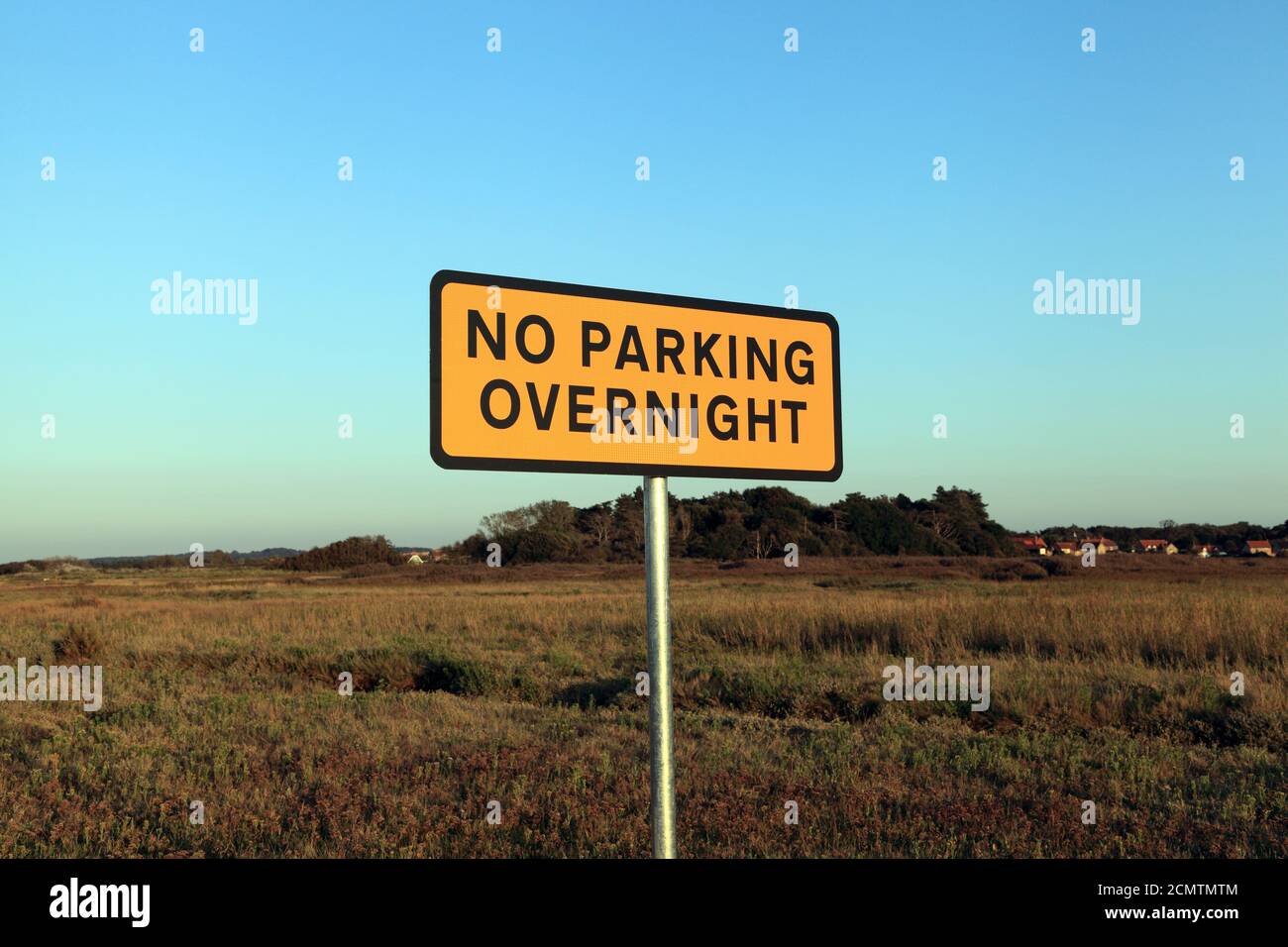 NO PARKING OVERNIGHT, warning sign, Thornham Marsh, Harbour, Norfolk, England, UK Stock Photo