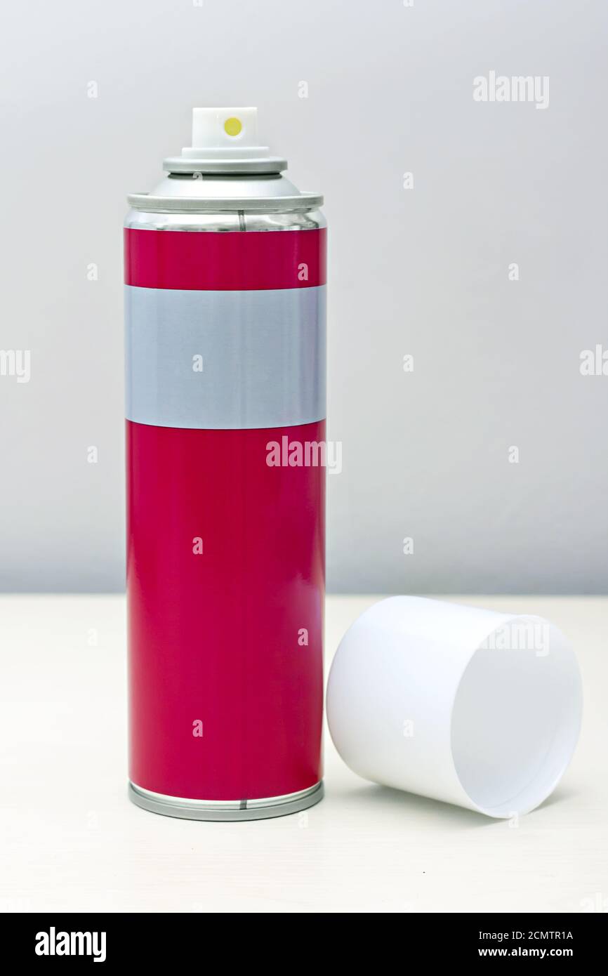 reddish gray with a white spray can lid Stock Photo Alamy