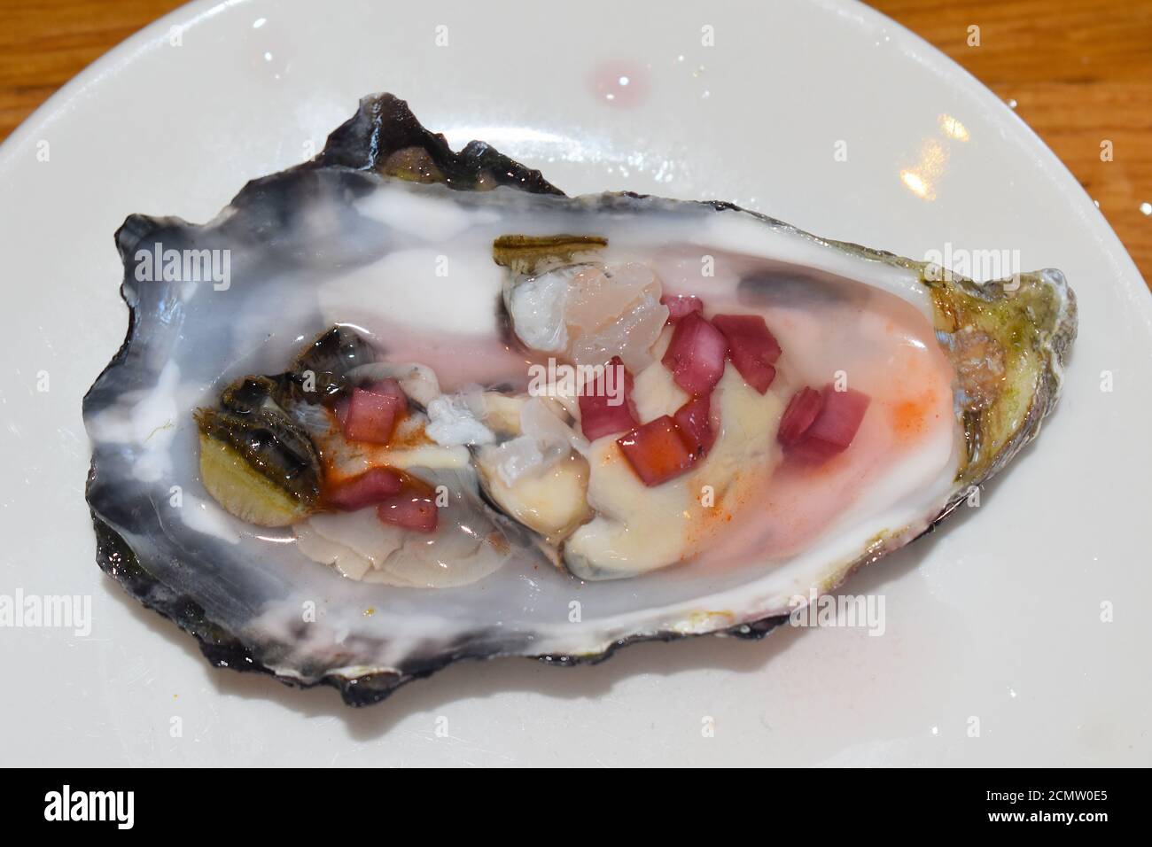 Oyster with red wine shallot vinegar They are bivalve molluscs of