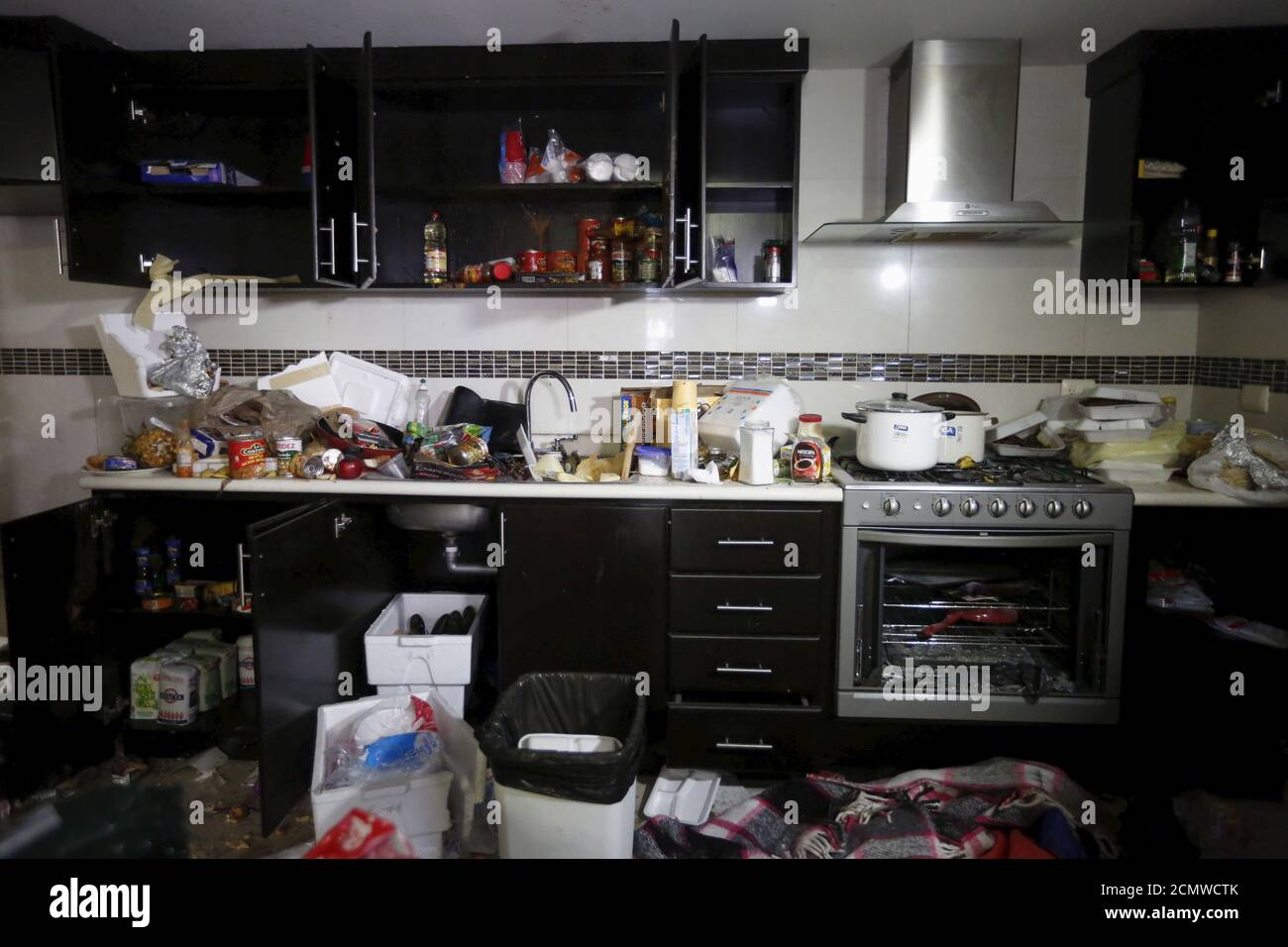 The kitchen at a safe house, where five people were shot dead during an operation to recapture the drug lord Joaquin 'El Chapo' Guzman, is seen at Jiquilpan Boulevard in Los Mochis in Sinaloa state, Mexico, January 11, 2016. REUTERS/Edgard Garrido Stock Photo