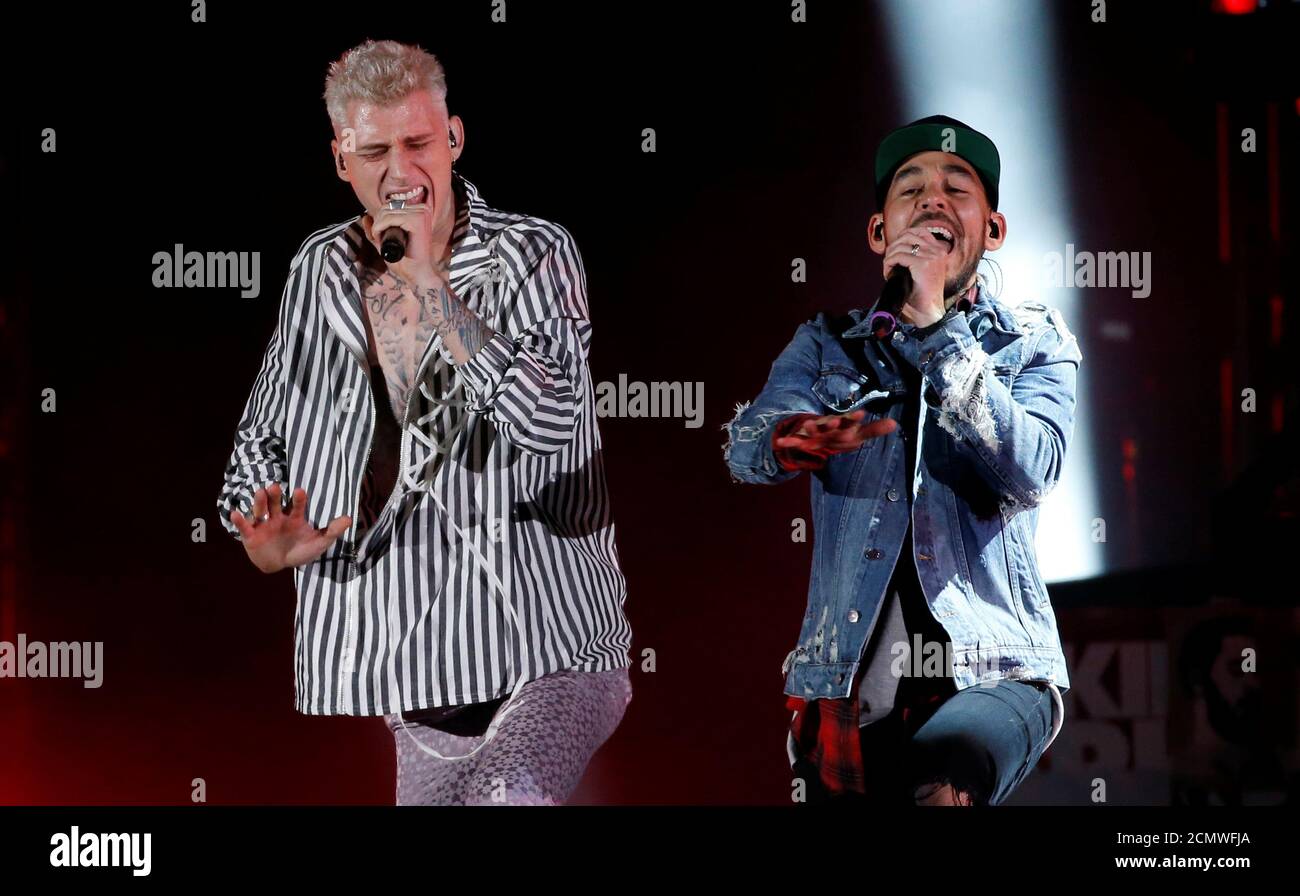 Mike Shinoda (R) of Linkin Park and Machine Gun Kelly perform during the "Linkin  Park & Friends Celebrate Life in Honor of Chester Bennington" concert at Hollywood  Bowl in Los Angeles, California,