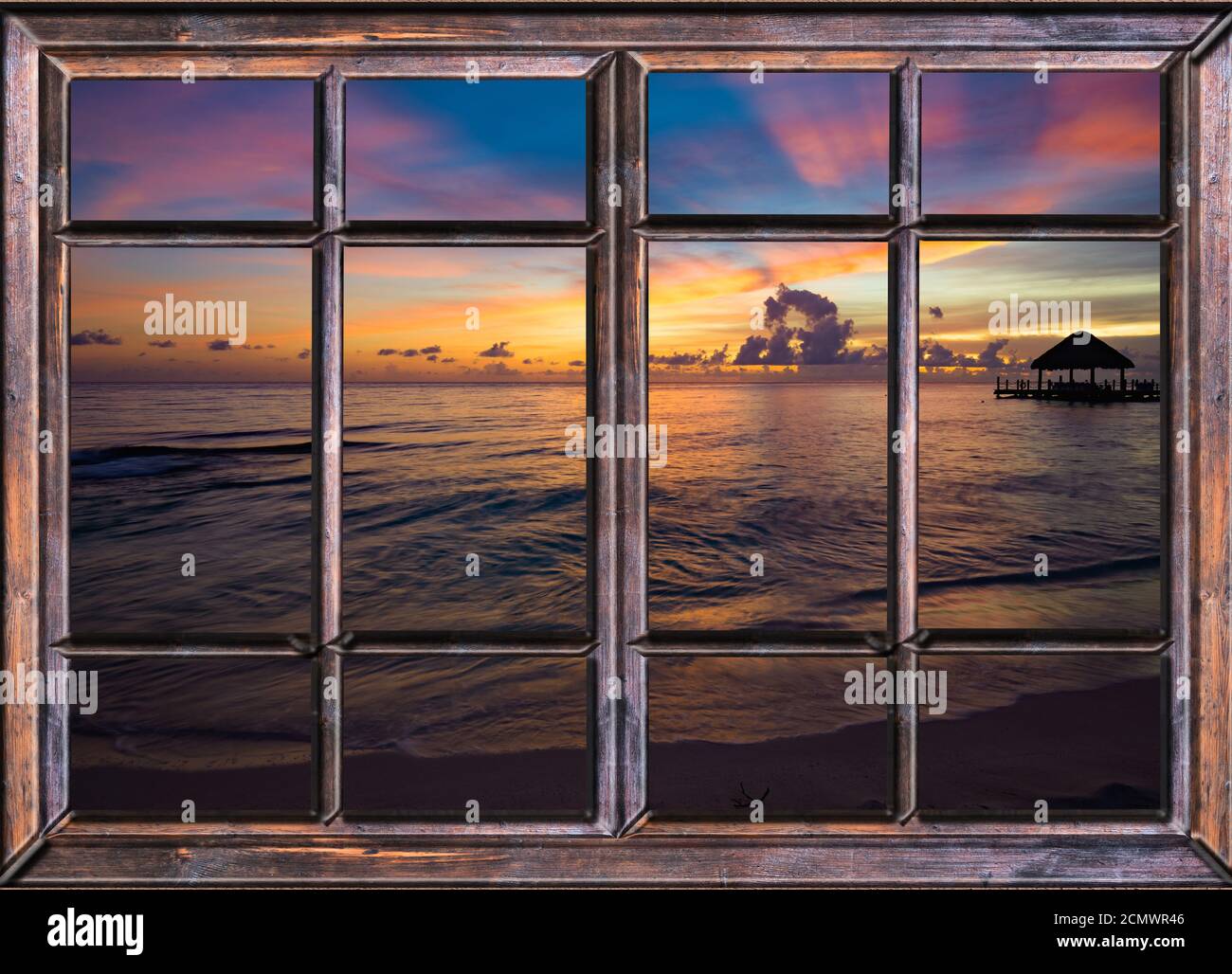 view from the open window of the caribbean sunset Stock Photo - Alamy