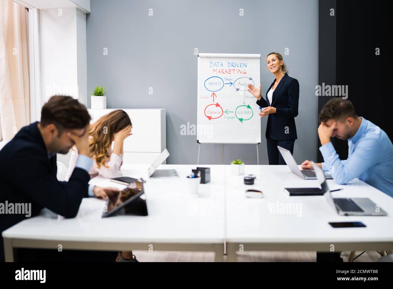Lazy Bored People Sleep In Office At Work Stock Photo