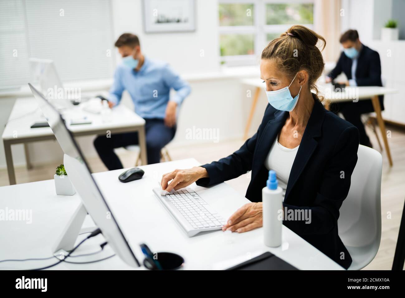Cleaning Computer Keyboard Using Sanitizer Alcohol Wipe Stock Photo - Alamy