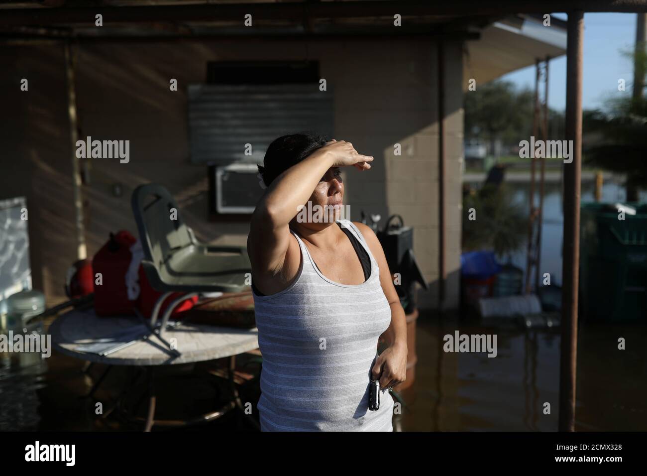 Melissa Delarosa is pictured outside her house, which was flooded after the  passing of Hurricane Irma in Immokalee, Florida, U.S. September 12, 2017  REUTERS/Stephen Yang Stock Photo - Alamy