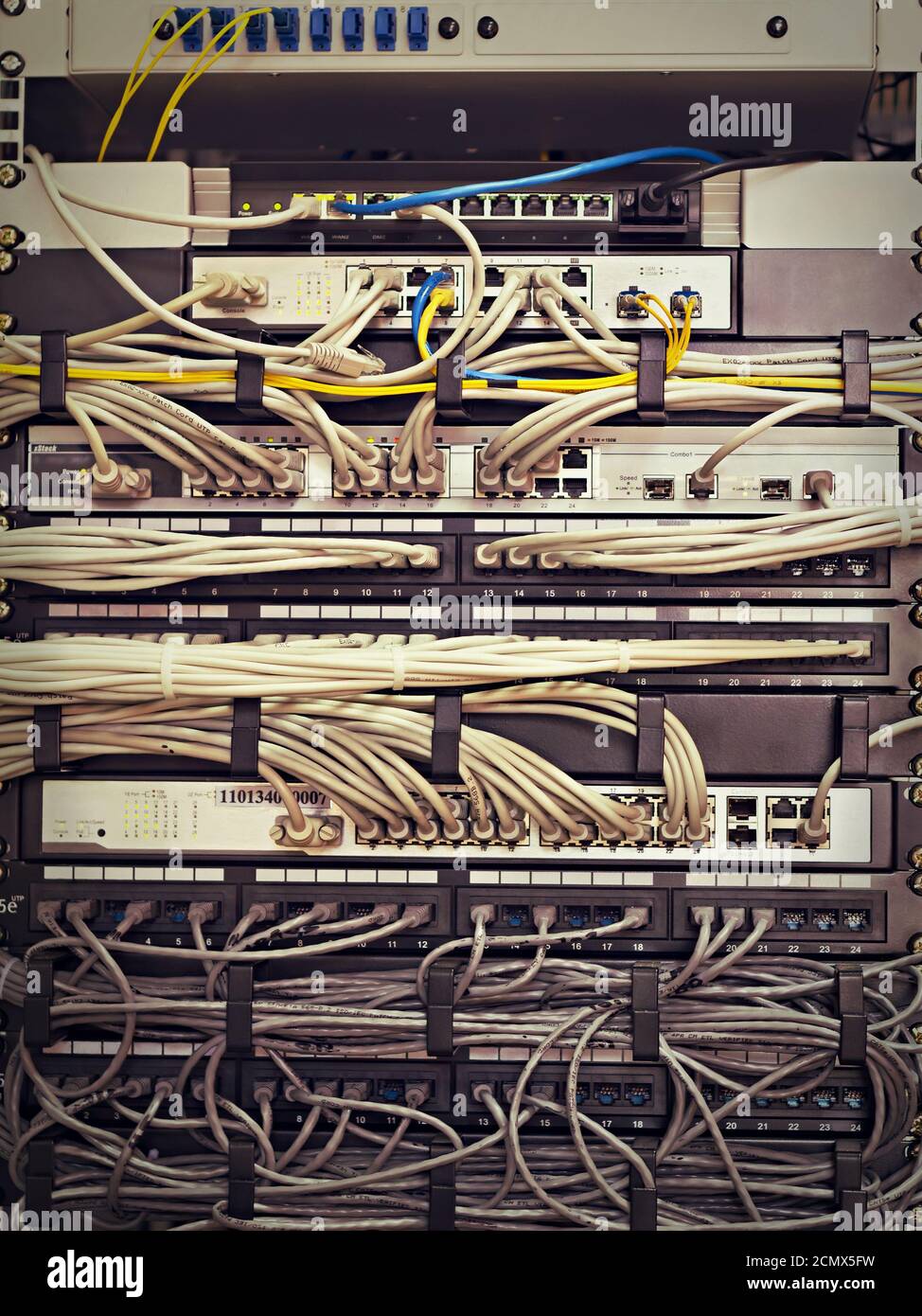Patch Panel server rack with cords in different colors Stock Photo - Alamy
