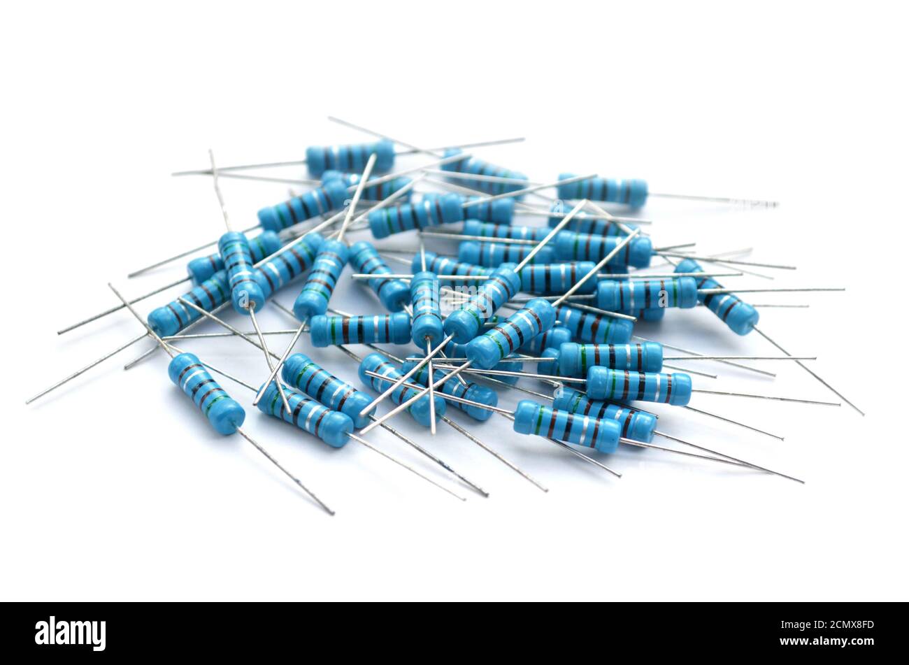 Group of blue resistors isolated on a white background. Passive two-terminal electrical component. Close-up, selective focus Stock Photo