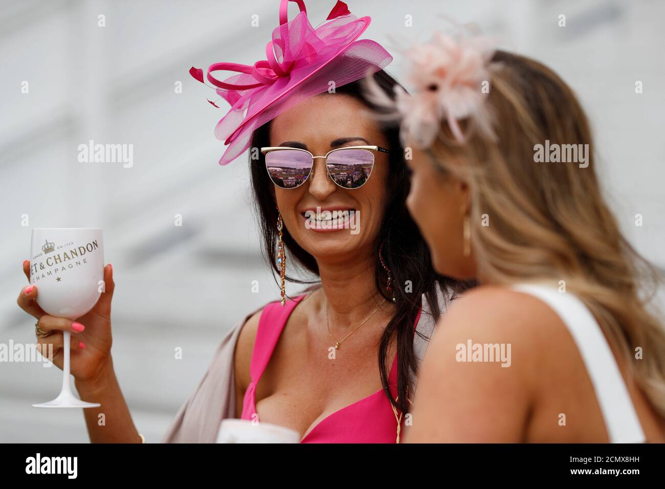 Horse Racing - Derby Festival - Epsom Downs Racecourse, Epsom, Britain - May 31, 2019   General view of racegoers   REUTERS/Peter Nicholls Stock Photo