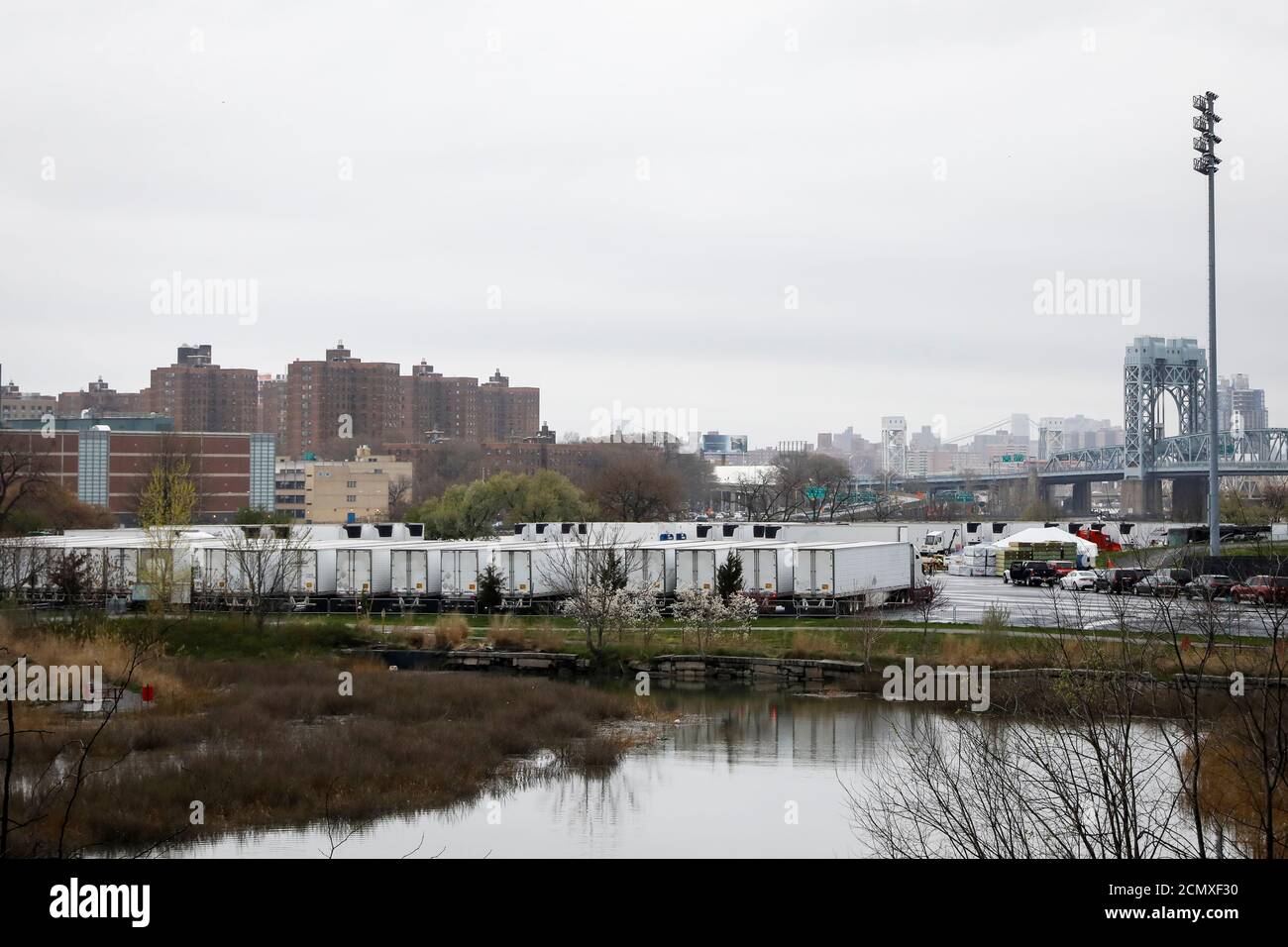 Refrigerated tractor trailers that can be used as morgues are seen, amid the coronavirus disease (COVID-19) outbreak, outside Icahn Stadium on Randall's Island in New York City, U.S., April 9, 2020. REUTERS/Brendan McDermid Stock Photo