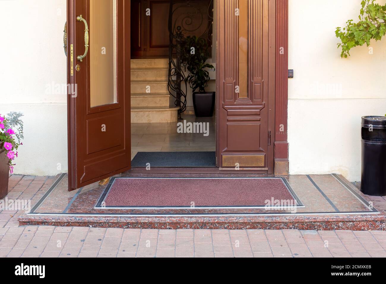 a threshold on entrance door with a handle in the hotel on facade of ...