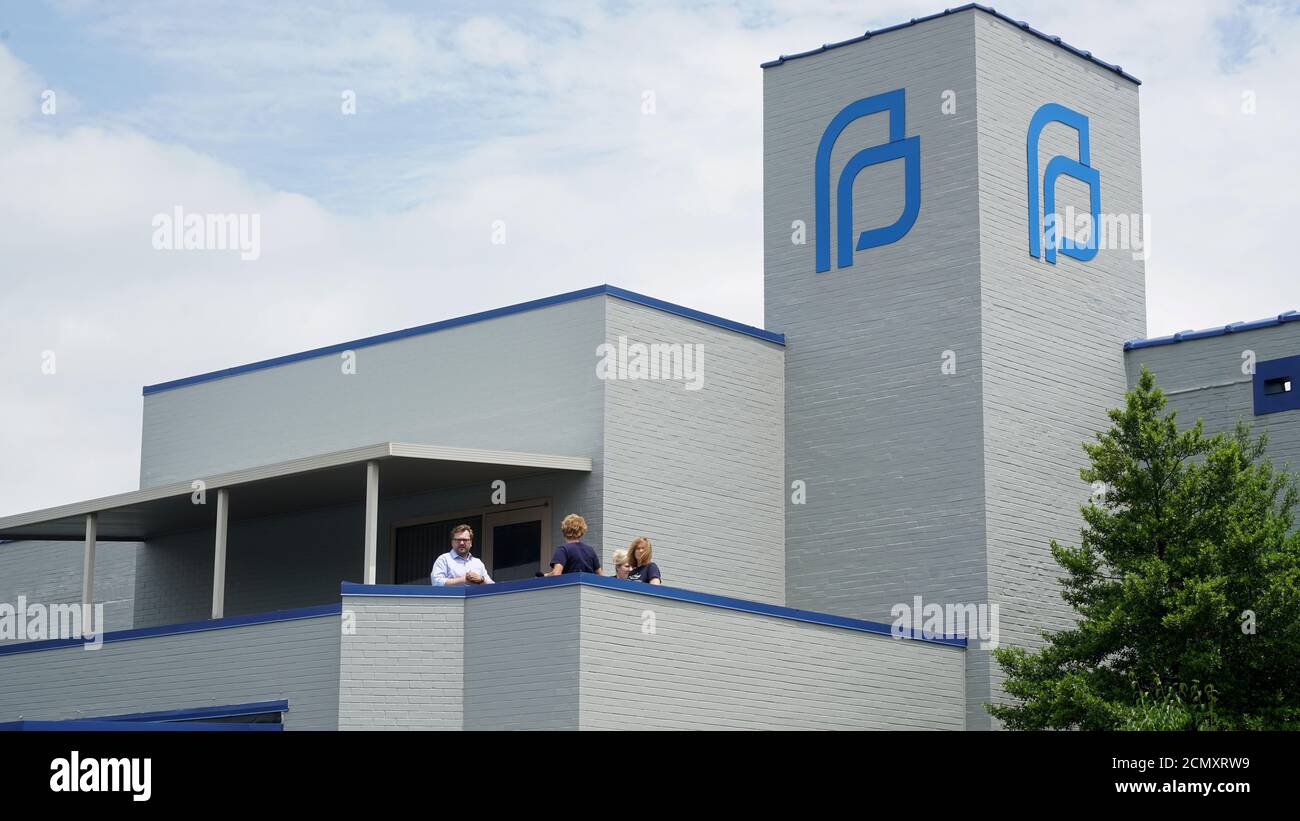 Planned Parenthood's employees look on as anti-abortion rights advocates hold a rally in St. Louis, Missouri, U.S., June 4, 2019. REUTERS/Lawrence Bryant Stock Photo