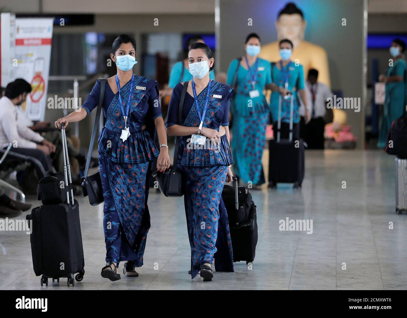 Sri Lankan Airlines Staff Wear Masks At Bandaranaike International Airport After Sri Lanka Confirmed The First