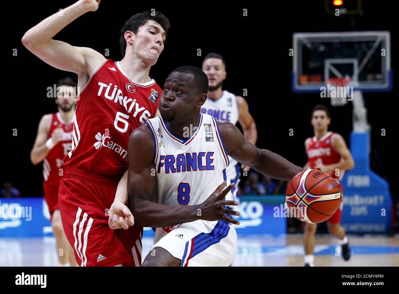 France's Charles Kahudi goes for the basket against Turkey's Cedi Osman  during their 2015 EuroBasket 2015 round of 16 match at the Pierre Mauroy  stadium in Villeneuve d'Ascq near Lille, France, September