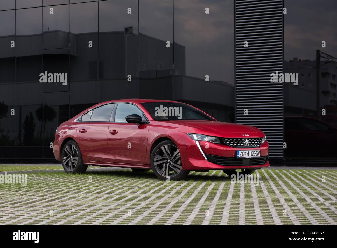 Brand New Peugeot 508 GT in beautiful red colour. Luxury business class  limousine Stock Photo - Alamy