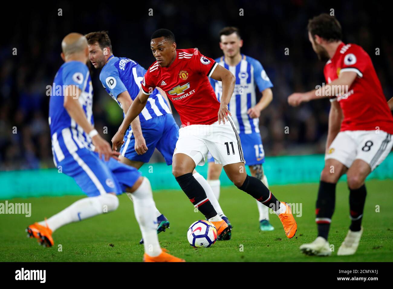 Soccer Football - Premier League - Brighton & Hove Albion v Manchester United - The American Express Community Stadium, Brighton, Britain - May 4, 2018   Manchester United's Anthony Martial in action with Brighton's Dale Stephens    REUTERS/Eddie Keogh    EDITORIAL USE ONLY. No use with unauthorized audio, video, data, fixture lists, club/league logos or "live" services. Online in-match use limited to 75 images, no video emulation. No use in betting, games or single club/league/player publications.  Please contact your account representative for further details. Stock Photo