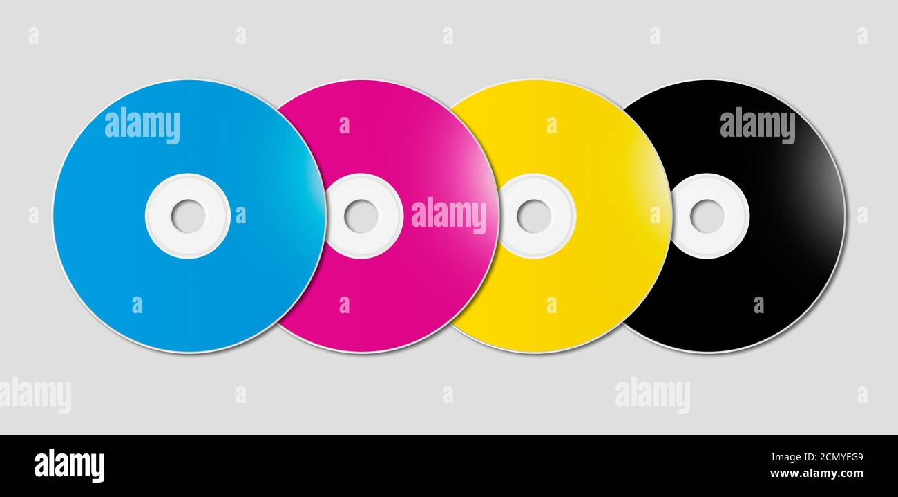 CMYK CD - DVD set on grey background Stock Photo - Alamy
