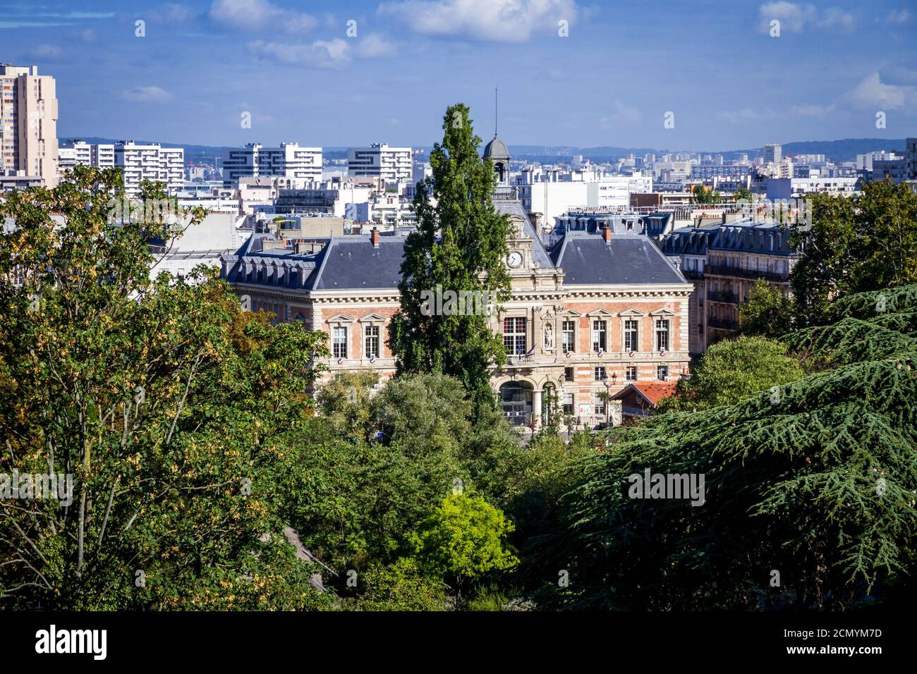 19th borough Town Hall view from the ButtesChaumont, Paris Stock Photo