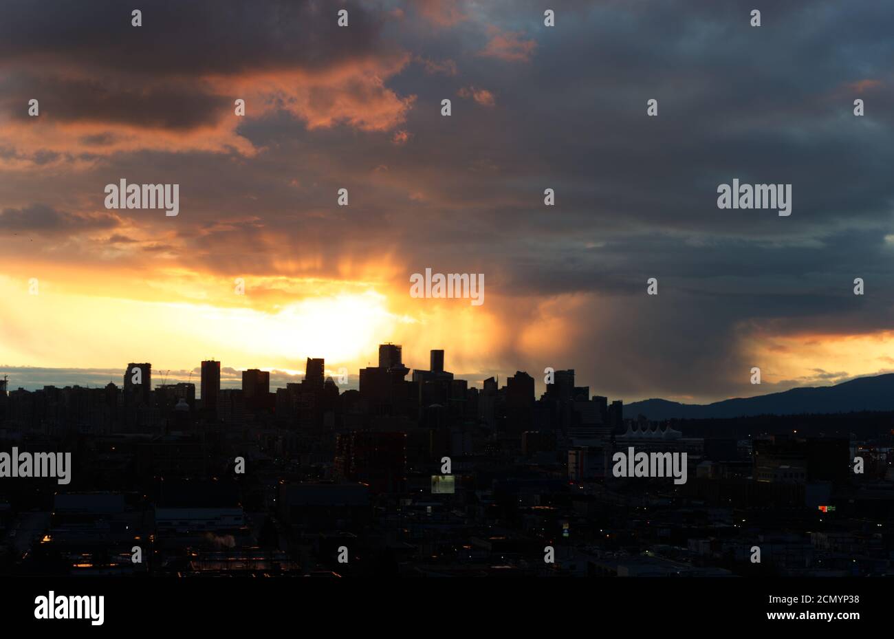 Vancouver Cloudy sunset, Vancouver BC Canada, City Sunset Stock Photo