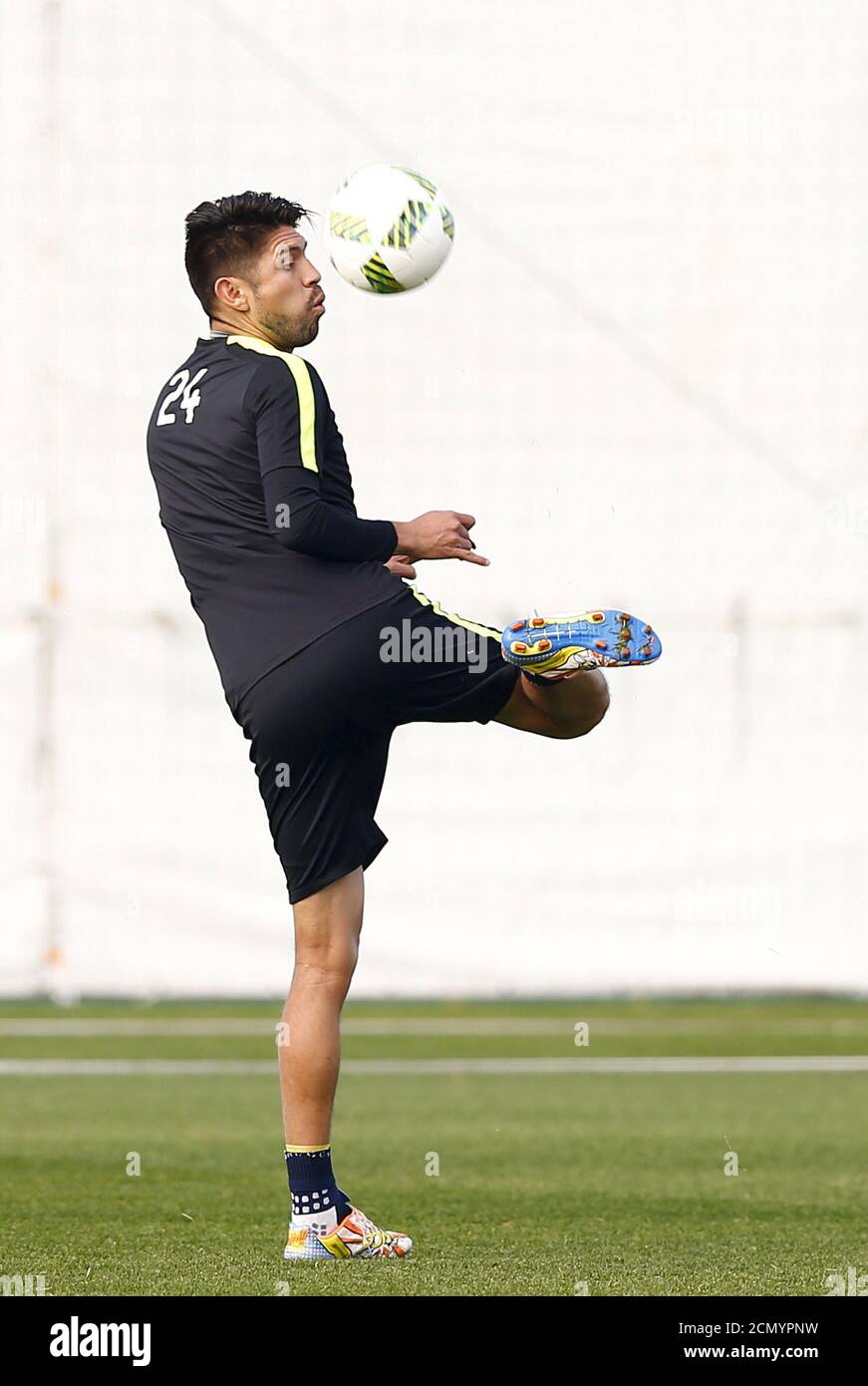Mexico's Club America player Oribe Peralta kicks a ball during a training  session before their Club World Cup soccer match against TP Mazembe in  Osaka, western Japan, December 14, 2015. REUTERS/Thomas Peter