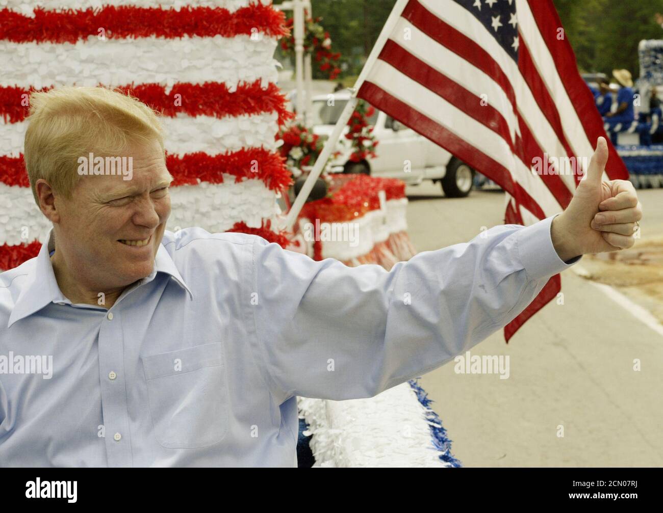 Democratic presidential hopeful U.S. Congressman Richard Gephardt of Missouri gives a thumbs up to spectators in Eastover, South Carolina as he rides on a float while serving as the Grand Marshall in the small town's parade May 3, 2003. Gephardt campaigned in Eastover before joining eight other Democratic presidential hopefuls in Columbia, South Carolina for the first candidates' debate of the 2004 U.S. presidential campaign later in the day. REUTERS/Jim Bourg  JRB/ME Stock Photo